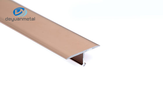 6063 il carattere di alluminio Andizing T di profili T5 dell'oro T di Rosa modella la disposizione di transizione del metallo per la decorazione della parete dell'hotel